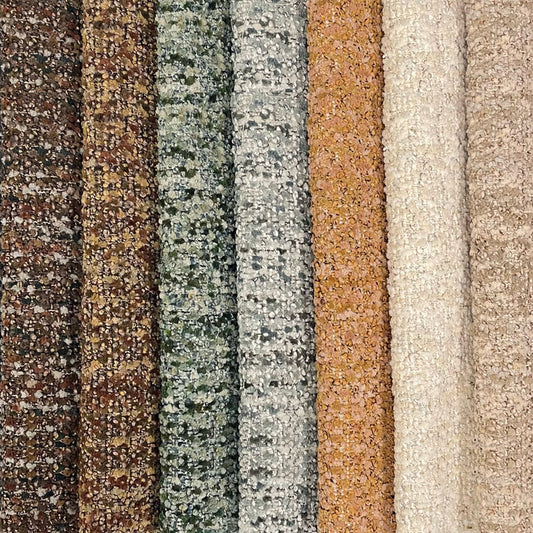 Collection of different textured fabric samples in various colors.