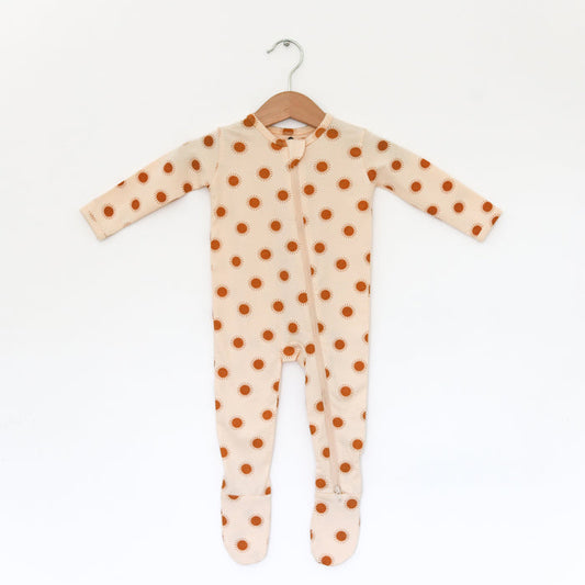 SUN PATTERNED FOOTED SLEEPER